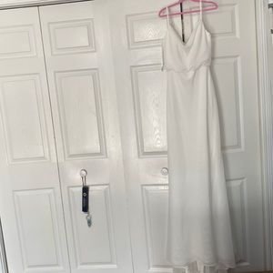 Vowe’d off-white wedding dress.